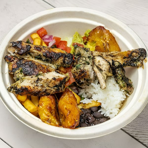 Picaso Chicken bowl with grilled chicken, rice, black beans, plantains, fries, and salsa.